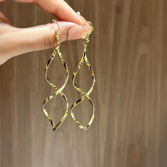 Golden Hollow Spiral Pattern Dangle Earrings Simple Leisure Style Alloy Jewelry Trendy Female Ear Ornaments